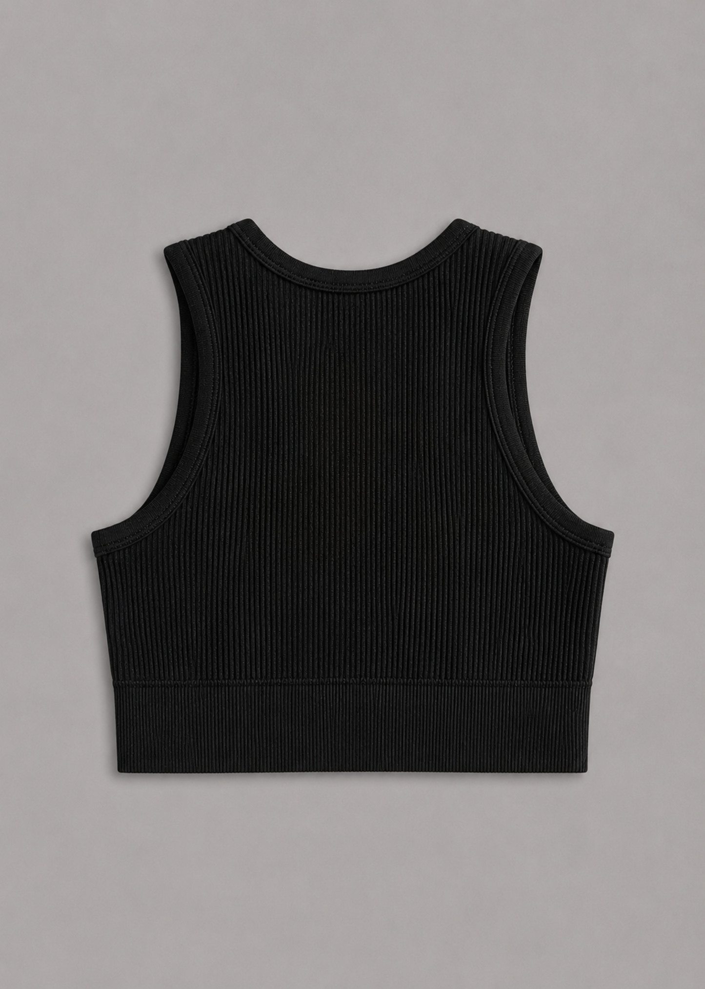 A black ribbed knit sleeveless crop top shown from the back, laid flat on a neutral gray background.
